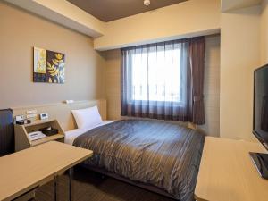 Sjónvarps- og/eða afþreyingartæki á Hotel Route Inn Minami Yokkaichi