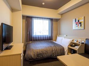 Sjónvarps- og/eða afþreyingartæki á Hotel Route Inn Minami Yokkaichi