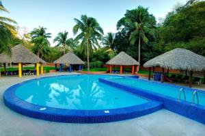 a pool at the resort at Las Brisas Huatulco in Santa Cruz Huatulco