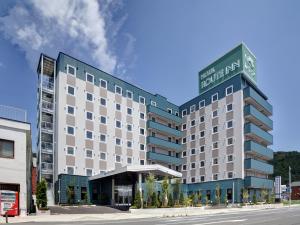 a rendering of the exterior of a hotel at Hotel Route-Inn Kamaishi in Kamaishi