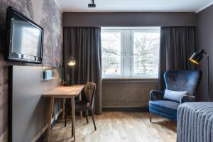 Televiisor ja/või meelelahutuskeskus majutusasutuses Quality Hotel Ekoxen