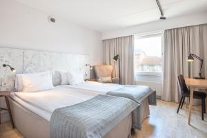 Voodi või voodid majutusasutuse Quality Hotel Ekoxen toas