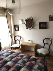 Postel nebo postele na pokoji v ubytování Casa Lupo