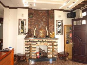 TV a/nebo společenská místnost v ubytování Villa Du lịch HUY HOÀNG