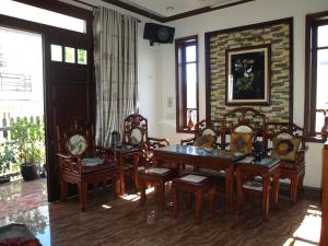 Posezení v ubytování Villa Du lịch HUY HOÀNG