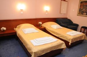 Katil atau katil-katil dalam bilik di Hotel Norcev