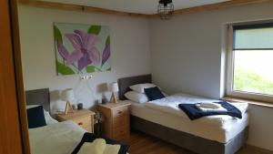 Posteľ alebo postele v izbe v ubytovaní Apartments Grillstube