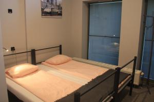 Posteľ alebo postele v izbe v ubytovaní Hostel City Center Gdynia