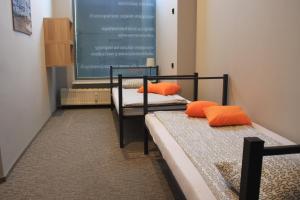 Posteľ alebo postele v izbe v ubytovaní Hostel City Center Gdynia