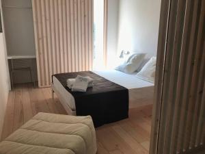 Posteľ alebo postele v izbe v ubytovaní Hotel Santacreu