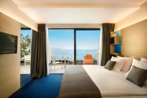 Posteľ alebo postele v izbe v ubytovaní Hotel Ičići - Liburnia