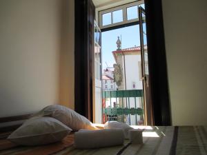 Ένα ή περισσότερα κρεβάτια σε δωμάτιο στο Guesthouse da Sé