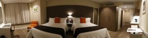 Krevet ili kreveti u jedinici u objektu Paseo La Galería Hotel & Suites