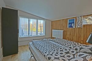 Postel nebo postele na pokoji v ubytování Strandens Apartment