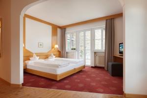 Postel nebo postele na pokoji v ubytování Hotel Goldene Rose