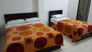 Una cama o camas en una habitación de Hotel Vermon Armenia