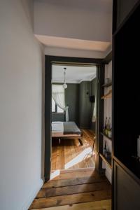 A bed or beds in a room at Mouse House Kapana Még 30 kép