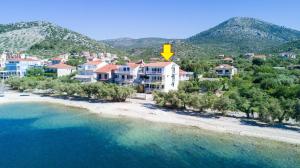 an aerial view of a resort on a beach at Villa Rozana in Seget Vranjica