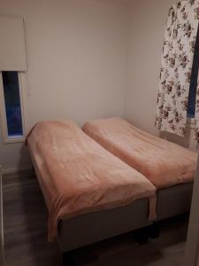 Postel nebo postele na pokoji v ubytování Camping Tornio
