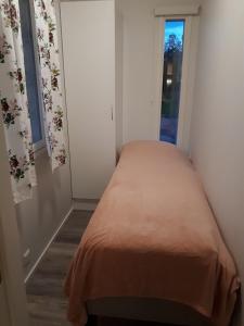 Postel nebo postele na pokoji v ubytování Camping Tornio