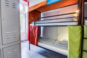 a bunk bed room with two bunk beds at Pal's Mini Hostel in Budapest