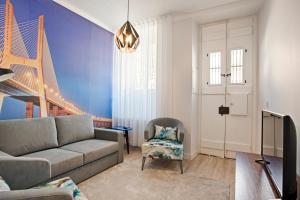 A seating area at BmyGuest - Ambassador Boutique Apartment II