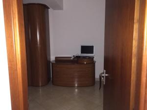 A television and/or entertainment centre at Sacca House