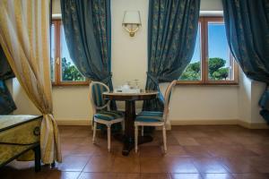 Posezení v ubytování Hotel Quadrifoglio Roma Eur