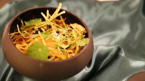 a bowl of food sitting on top of a table at Occidental Faro in Faro