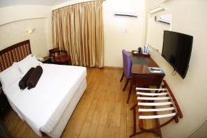 TV a/nebo společenská místnost v ubytování New Mwanza Hotel