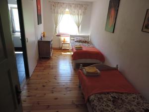 Postel nebo postele na pokoji v ubytování Pod Miotełką