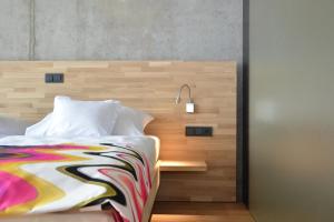 Letto o letti in una camera di Hotel de l'Ecluse Superior