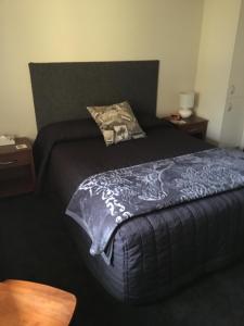 Postel nebo postele na pokoji v ubytování Mount View Motel Hawera