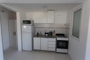 Una cocina o kitchenette en Aparthotel Aldea Termal