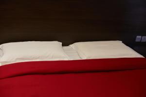 Cama o camas de una habitación en Axis Suites