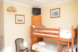 מיטה או מיטות קומותיים בחדר ב-Chandos Premier Folkestone (Channel Tunnel) Hotel