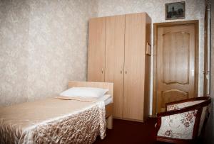 Кровать или кровати в номере Дом Достоевского