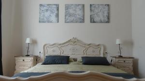Ліжко або ліжка в номері Corte di Langa