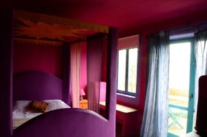 Postel nebo postele na pokoji v ubytování Hotel Alma de Romero