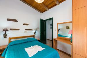 Säng eller sängar i ett rum på Chrysa Villa