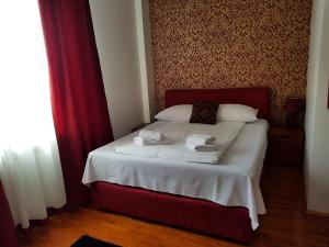 Ένα ή περισσότερα κρεβάτια σε δωμάτιο στο Hotel BOB