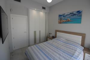 Postel nebo postele na pokoji v ubytování villamartin + 21 fotografií