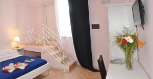 Postel nebo postele na pokoji v ubytování B&B Marebello