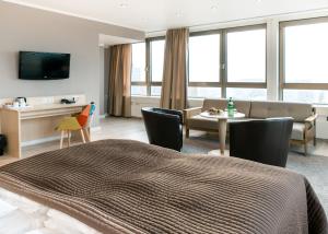 טלויזיה ו/או מרכז בידור ב-Hotel Astor Kiel by Campanile