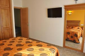 Postel nebo postele na pokoji v ubytování Hotel de Alba