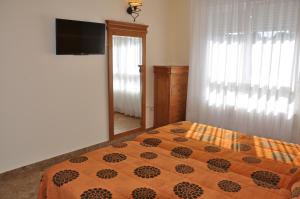 Postel nebo postele na pokoji v ubytování Hotel de Alba
