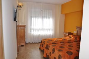 Postel nebo postele na pokoji v ubytování Hotel de Alba