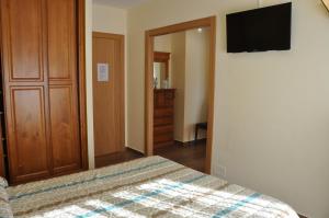 Postel nebo postele na pokoji v ubytování Hotel de Alba