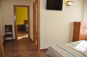 Postel nebo postele na pokoji v ubytování Hotel de Alba