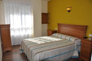 Postel nebo postele na pokoji v ubytování Hotel de Alba